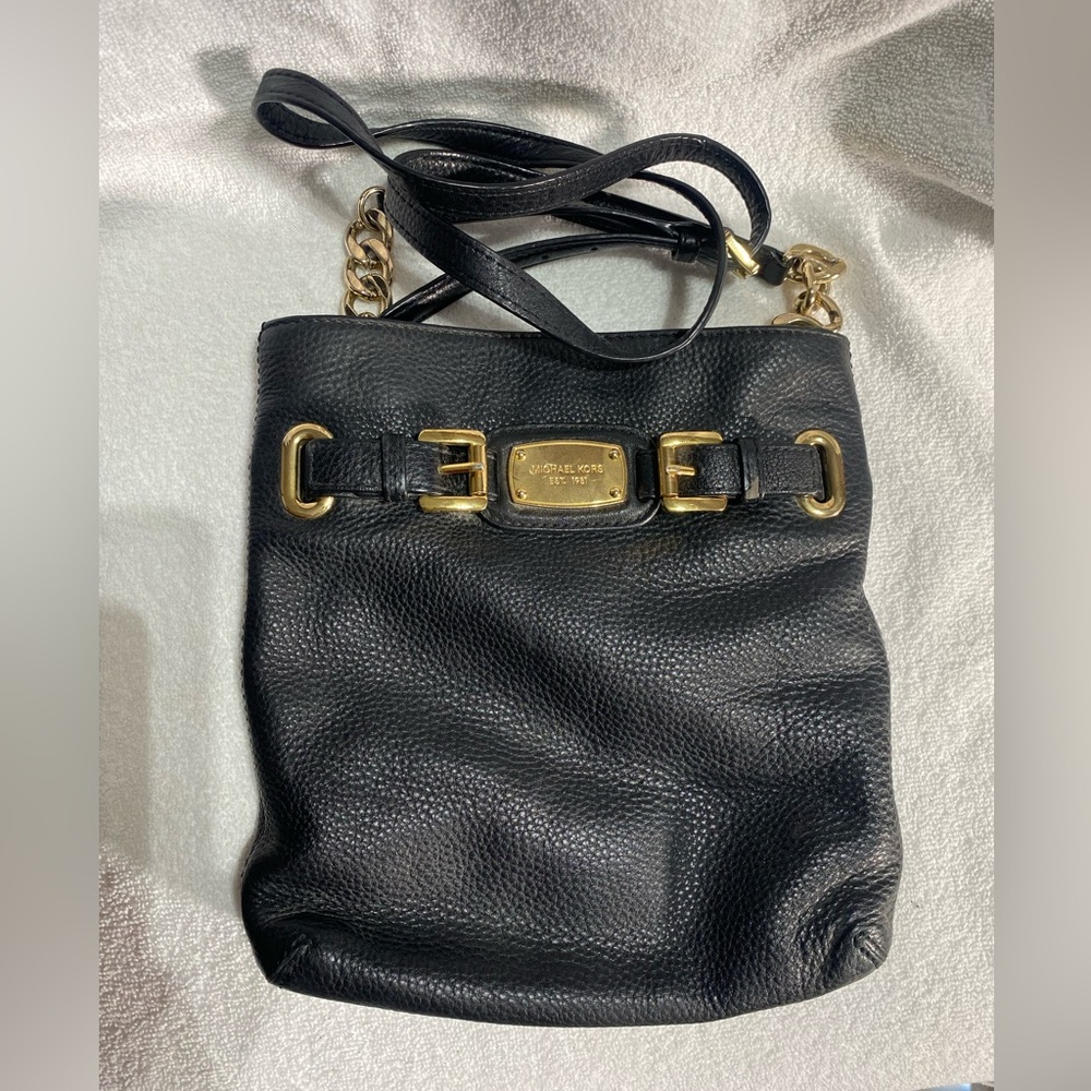 Michael Kors black crossbody bag goes with everything soft pebbled leather.